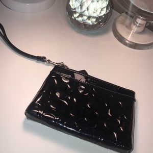 Black patent leather Coach wristlet
